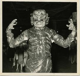 [Attendee in sea monster costume at "Undersea" Beaux Arts Ball]